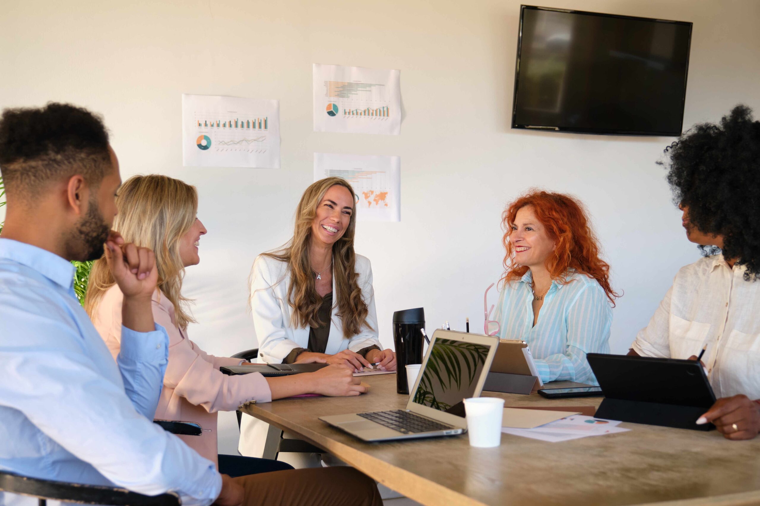 Relaxed informal IT business startup company meeting. Diverse group of business people.